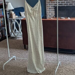 Chic Cream Slip Dress with Subtle Floral Design